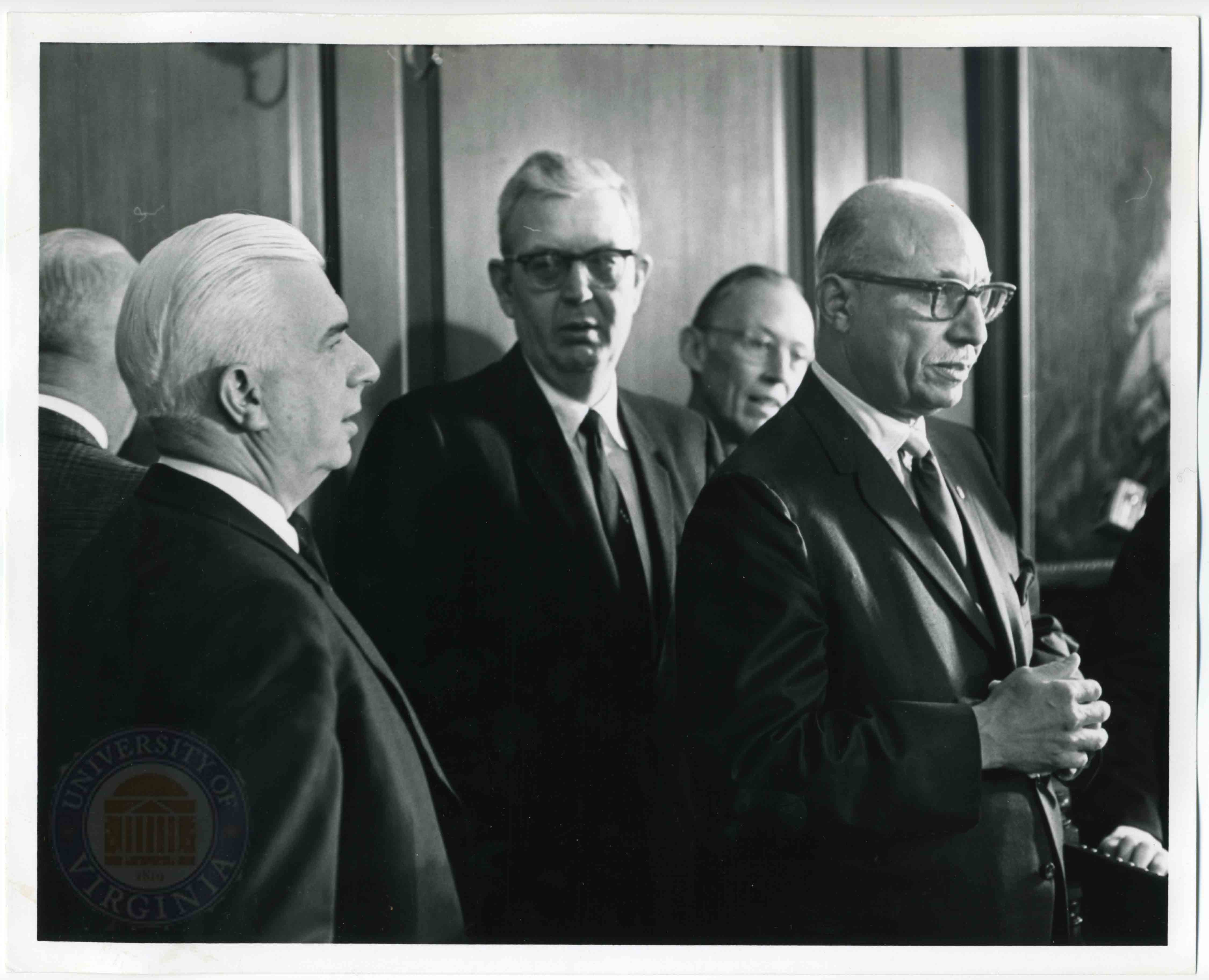 Photograph of 3 men.