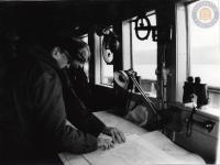 Hardy C. Dillard at Beagle Channel Studying Map Aboard a Ship
